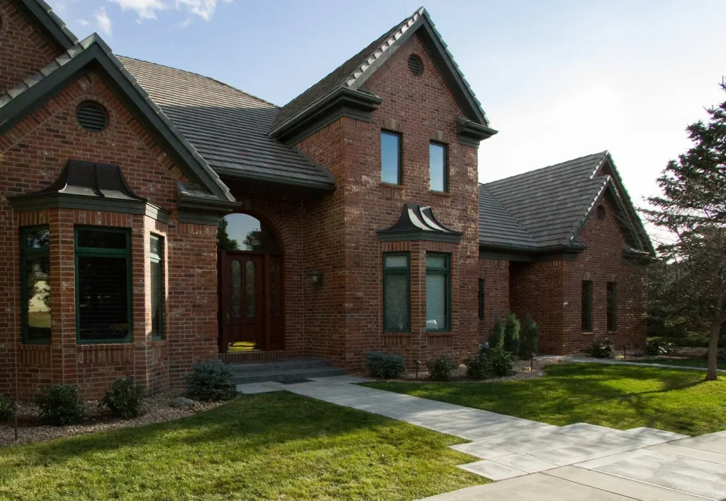 IMG_0020-2_1449x1000-203a0b55-1920w Denver contemporary victorian-style brown brick home with a green front yard.