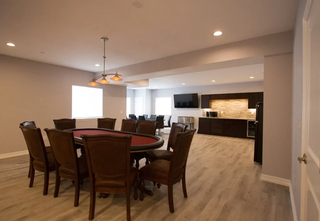 IMG_0031_1449x1000-46b56512-1920w Contemporary basement refinish including wet-bar, hardwood flooring, new lighting and cabinetry.